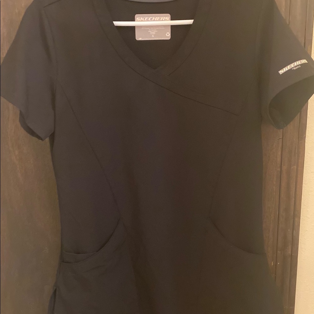 Women’s black Sketchers brand scrub set